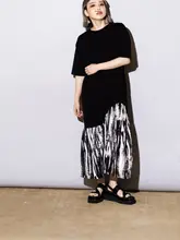 デザイン性のあるフィッシュテールTシャツワンピース【フリル付き・ルーズフィット・不規則なデザイン】