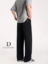 ブラックのゆったりストレートパンツ【ゴムウエスト・カジュアル・通気性】（セットアップ対応）