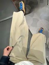 カーキ色のリラクシングワイドパンツ【大きいサイズ・ストレート・工装スタイル】（セットアップ対応）