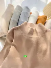 洗練されたデザインのグレー セミハイネックニットトップス【ウール混・女性用・秋冬用・スリムフィット】