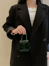 優雅なリボン付きハンドバッグスタイルのスマートフォンケース【折りたたみ式・防衝撃・高級感】