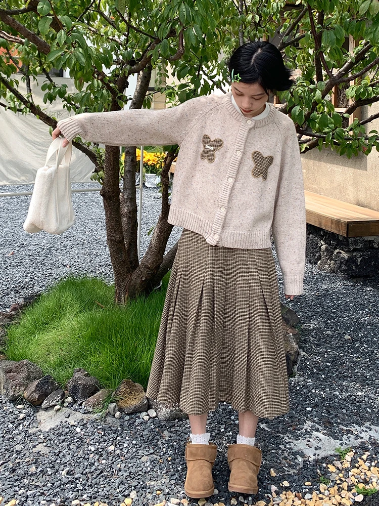 プリーツスカート コーデ 完全ガイド｜千鳥格子とトップスの相性を徹底解説