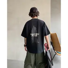 ユニセックス ルーズフィットラウンドネック半袖Tシャツ【アメリカンヴィンテージスタイル・カジュアルデザイン】（セットアップ対応）