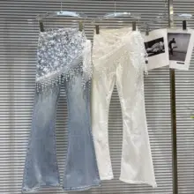 トレンドの流行にぴったり！トッパー刺繍デザインのフリンジ付きデニムパンツ【フレア・レディース】