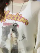 春の猫柄プリントニットトップス【ゆったりシルエット・クルーネック・女性用】