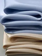 高級感あふれるダブルフェイスサテンシャツ【X型・パール装飾・エレガントデザイン】