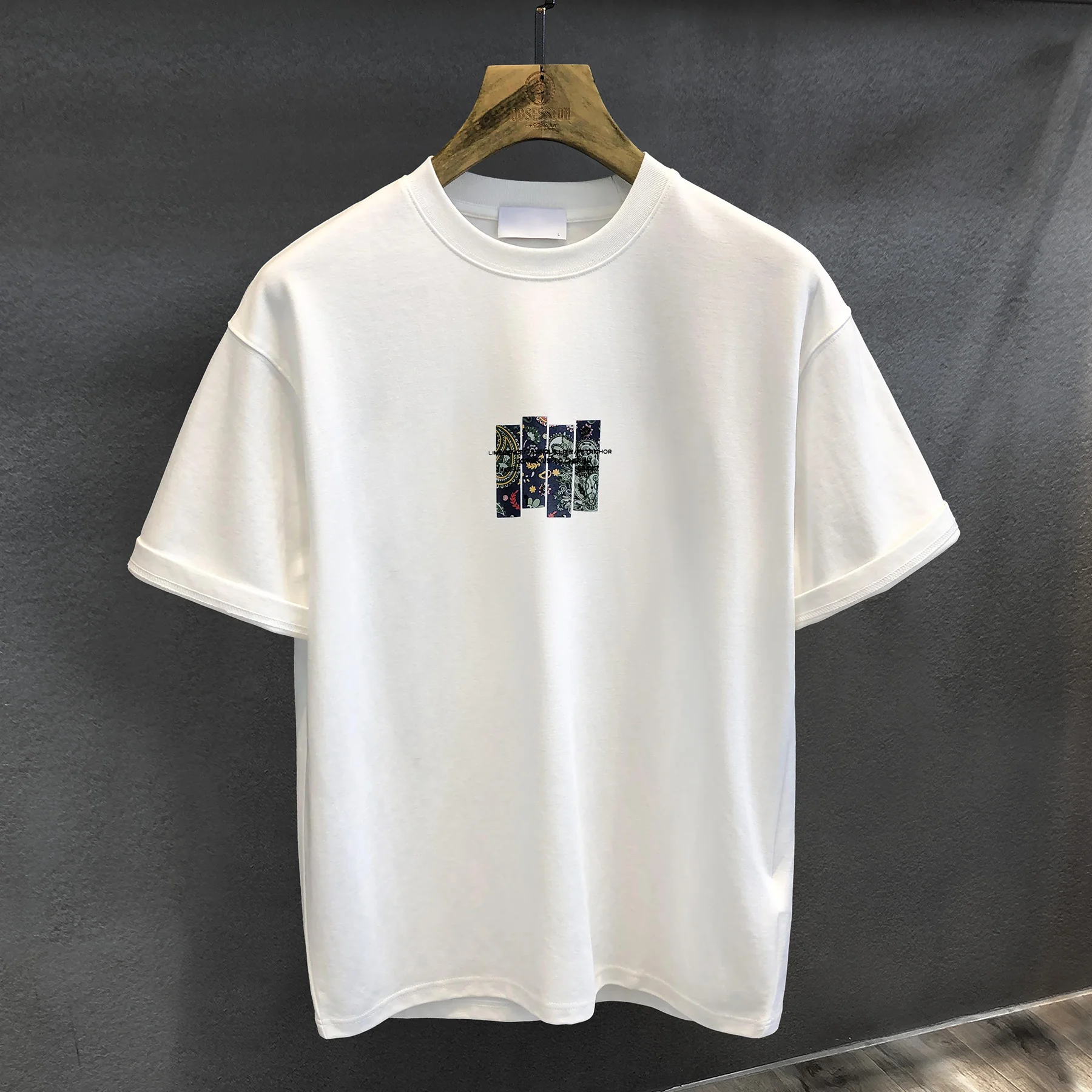 tシャツ 2枚重ねで失敗しない方法は？民族風レトロ織りTシャツが持つ、夏の通気性とスタイルの秘密