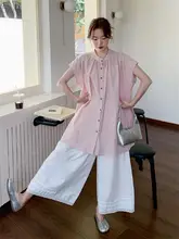 オーバーサイズ フレアスリーブ ベストとワイドパンツの春夏ファッション（セットアップ対応）