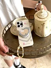 洗練されたデザインのスマホストラップ【淡いピンク・高級感】