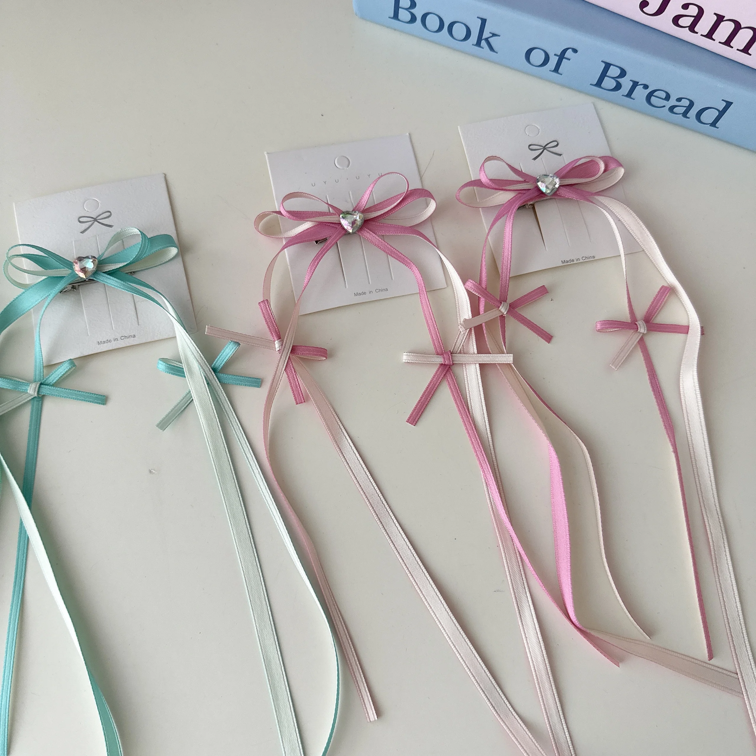 リボン付きヘアクリップを選ぶときに迷うのは、本当に「形」なのか？