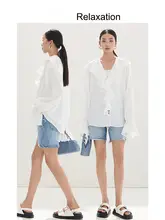 女性用 ホワイト シャーリングデザインの長袖ブラウス【フリル・リボン付き・ゆったりシルエット】