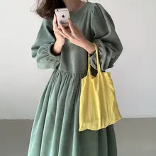 ルーズフィットのコーデュロイワンピース【裾フレア・パフスリーブ・高腰デザイン】