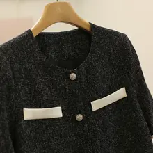 気品あるゆったりシルエットのワンピース【半袖・黒・細見え効果】