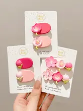 優しいピンク色のポンポンヘアクリップ【サイドクリップ・少女向け・前髪用】