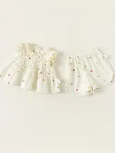 夏用 女の子向け可愛いフリル付きドット柄トップスとショートパンツ（セットアップ対応）