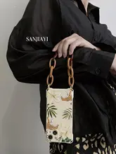 レトロフラワーヒョウiPhone用保護ケース【ストラップ付き・衝撃吸収・14Plus・12Pro Max・11対応】