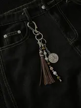 手作りビーズバッグチャーム【古風なタッセル付き・ウエスト用・高級感あるデザイン】