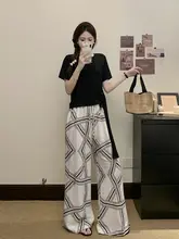 した夏のコーディネートに！デザイン性のある結び付き短袖トップスとユニークなスタイルのワイドパンツ（セットアップ対応）