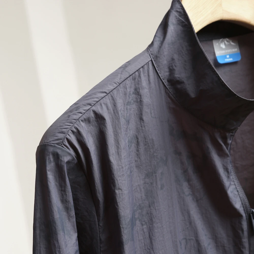 黒い服で日焼けを防ぐための実用的なアウター選定：極上の柔らかさのカモフラージュ紫外線対策アウター