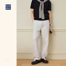 高密度素材の黒いカジュアルパンツ【ストレートシルエット・皺になりにくい・飾り切り替えデザイン】