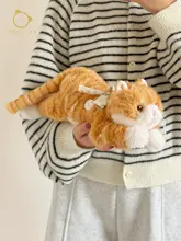 小橘猫の毛糸でできた抱き心地の良いぬいぐるみ【誕生日ギフトに最適】