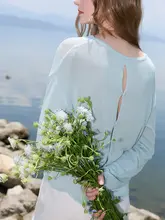 デザイン性のあるレーシングニットトップス【丸首・広めのシルエット・透かし編み】