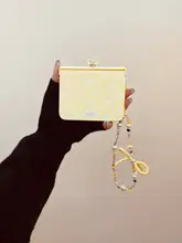 春の小雛菊デザインの折りたたみ式スマホケース【創意回転花デザイン・対応機種多数】