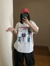 カジュアルなアメリカンスタイルのTシャツ【ユーモラスな犬のデザイン・ゆったりシルエット・カップル向け】