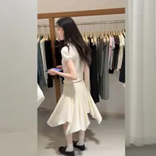 学院風ダイヤモンドチェック柄の短袖ニットトップスと不規則なメッシュスカート【小柄向け・スタイルアップ・セットアップ対応】