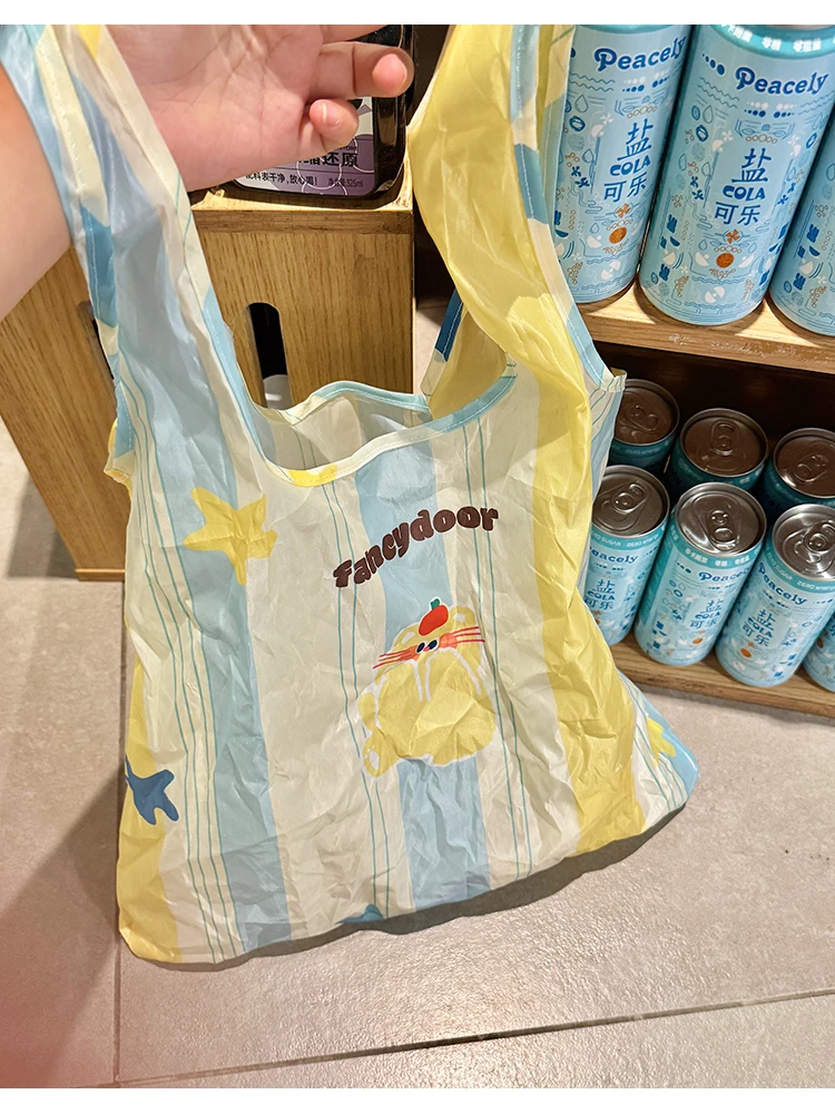 かわいいデザインの折りたたみエコショッピングバッグ：買い物節約に役立つ実用性と使い勝手の分析