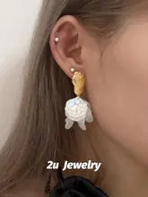 貝殻模様の不規則なボディピアス【925銀針・ゴールド・高級感】