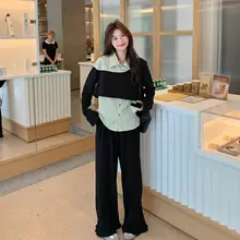 個性的なストライプシャツとワイドパンツのコーディネート（セットアップ対応）