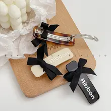ヘアクリップ バネクリップ 蝶結び べっ甲柄 ミニ 髪量少なめ ハーフアップ 韓国製「ribbon」