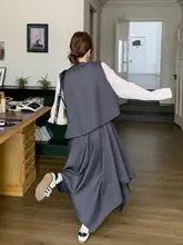 感満載のルーズフィットトップスとカジュアルベスト、イレギュラーヘムのスタイルアップスカート【秋用・（セットアップ対応）】