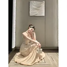 個性的なバックスリットトップス【ノースリーブ・ハイネック・ウエスト絞り】