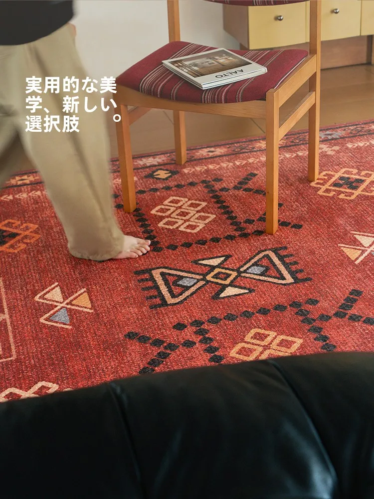 幾何学模様の赤いラグ：ダイニングテーブル下に敷くための実用性と耐久性の検証