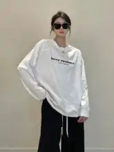 綿100%のウォッシュ加工済みカジュアルロングスリーブTシャツ【ゆったりシルエット・ロゴプリント・秋用】