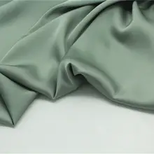 豆緑の麻サテン生地【微ストレッチ・光沢感あり・ドレス用】