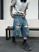 アメリカンレトロ風のダメージデニムショートパンツ【フリンジ付き・ルーズフィット・カジュアルスタイル・七分丈】（セットアップ対応）