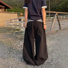 デザイン性抜群のチェック柄ワイドパンツ【トレンド・ゆったり・フルレングス】