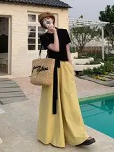 気品溢れるスタイルの女性用コーデ【ファッション・系紐・短袖・ワイドパンツ】（セットアップ対応）