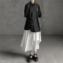 デザイン性のある不規則なシルエットの黒い長袖シャツ【ダークスタイル】