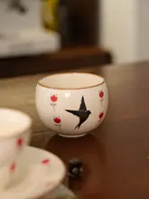 手描き陶器製 コーヒーカップ＆ソーサー【セサミ釉・トリのデザイン・持ち手付き】（セットアップ対応）