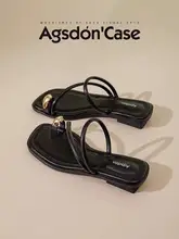 美しいデザインの黒いフラットサンダル【フレンチスタイル・クロスストラップ】（セットアップ対応）