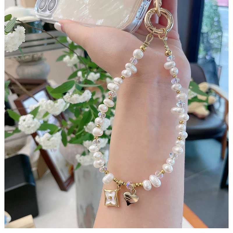 天然淡水パール携帯リング：幸運の花びらを象徴する高品質なアクセサリー