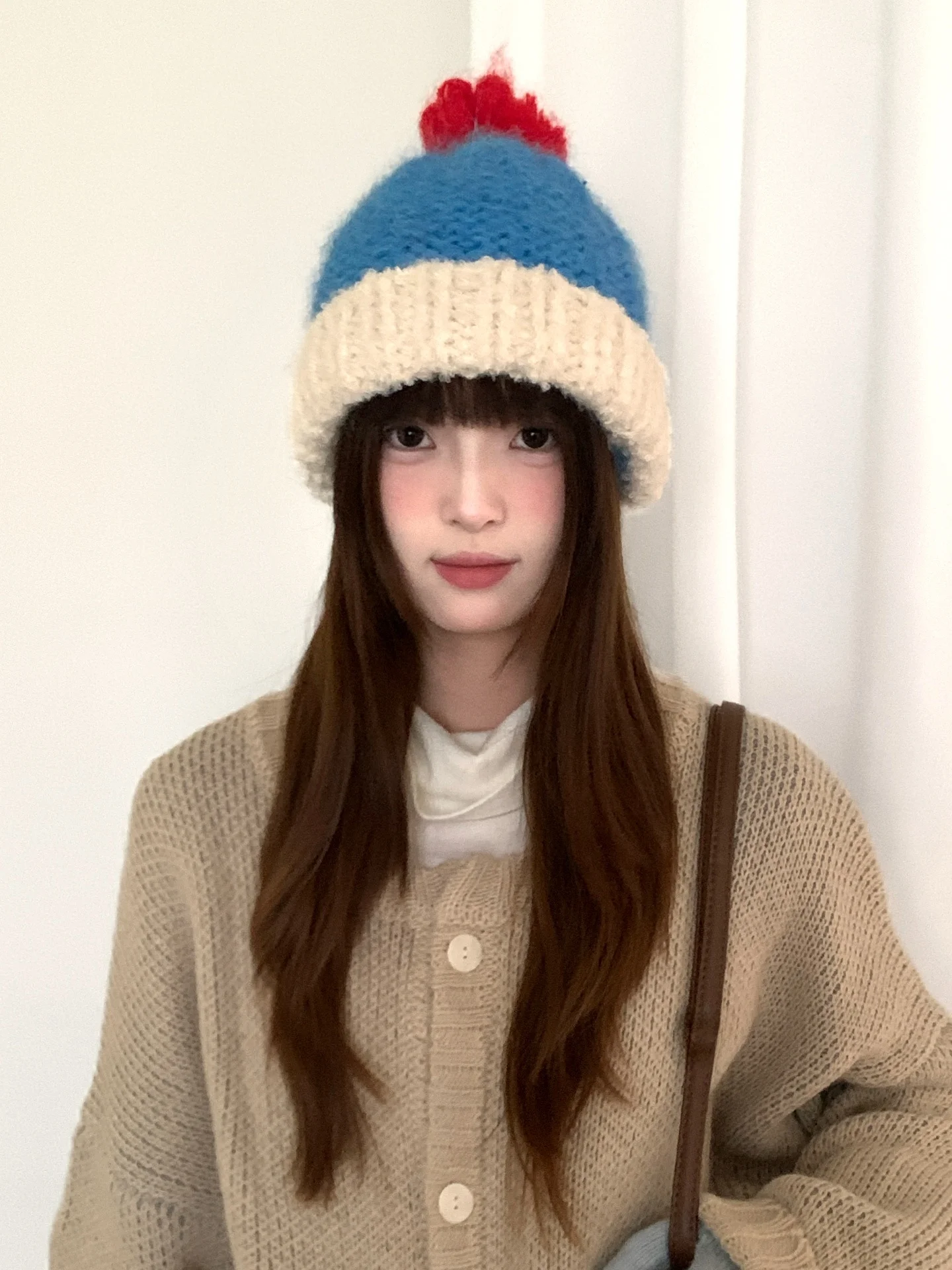 カラフルなポンポン付きニット帽：女性向け冬季用の保温性とデザインを徹底解説