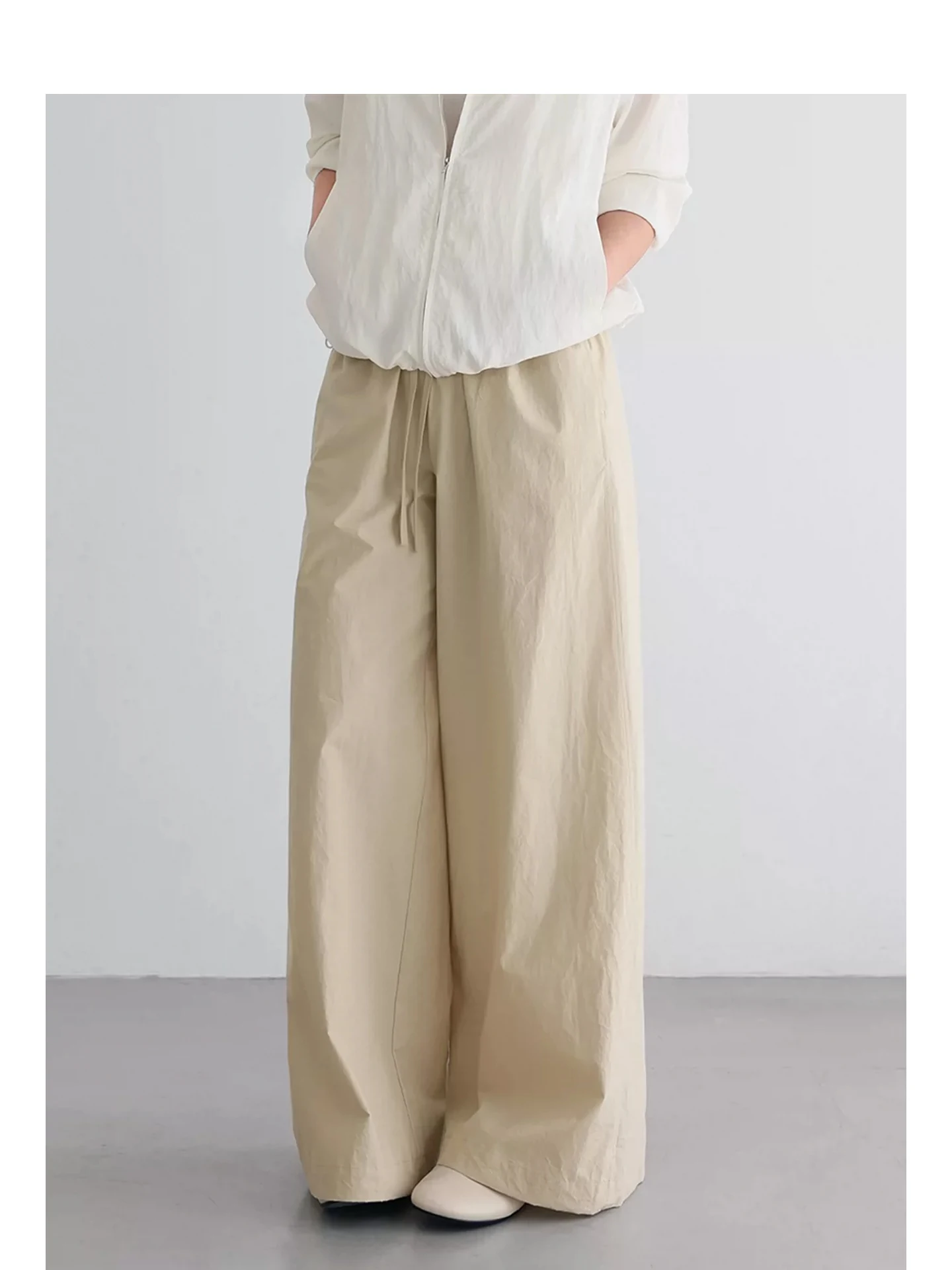 近江晒布シリーズのウエスト抽绳付きワイドストレートパンツ：ダボダボ感を克服する通勤向けの柔らかさ設計