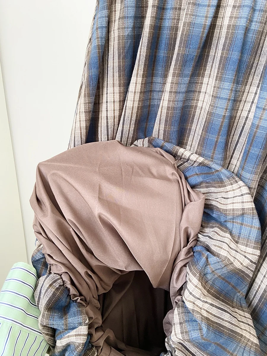 レトロチェック柄ロングスカート：ダサいと見なされるデザインをどう着こなすか