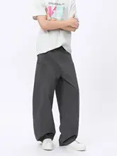 立体的なデザインのウエストが中位のワイドレッグ多ポケットカーゴパンツ（セットアップ対応）