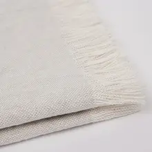 現代風の軽やかさ！浅灰色フリンジデザインのソファブランケット【オフィス用・おしゃれなインテリア】